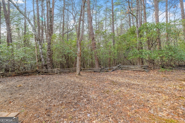 view of local wilderness with a view of trees