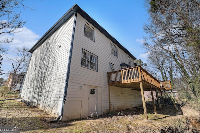 rear view of property with a deck