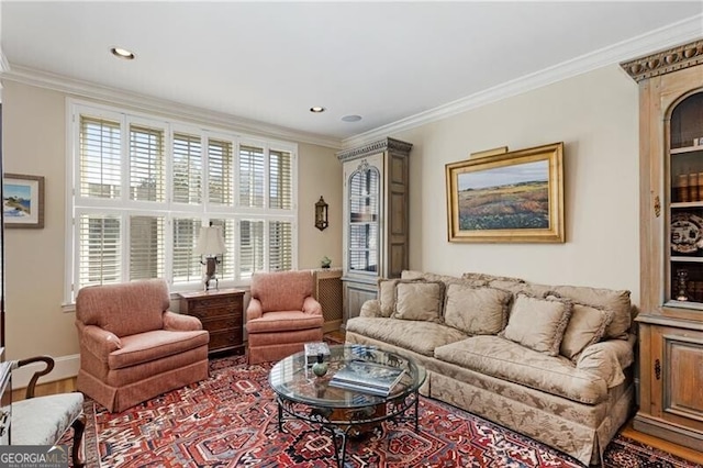 living room with recessed lighting, crown molding, baseboards, and wood finished floors