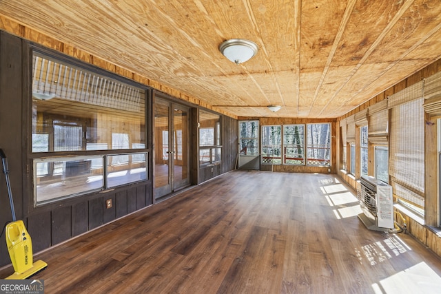 unfurnished sunroom featuring wood ceiling