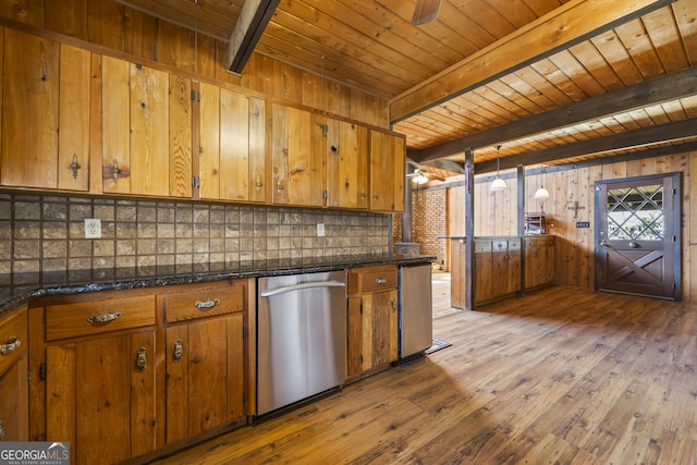 kitchen featuring decorative backsplash, brown cabinetry, dishwasher, and beamed ceiling