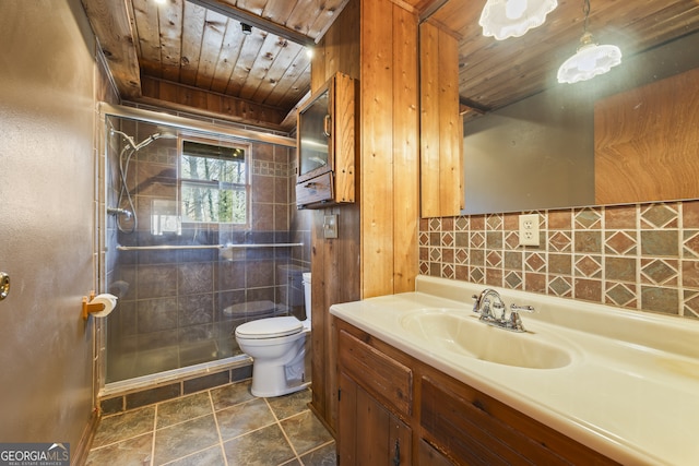 bathroom with wood ceiling, a tile shower, vanity, and toilet