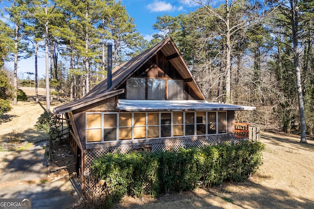 exterior space with a sunroom