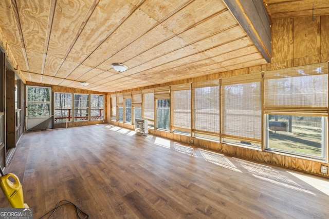 unfurnished sunroom featuring wooden ceiling