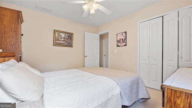 1657 Stilesboro Ridge Dr, Kennesaw, GA 30152 - bedroom featuring a closet, light carpet, and ceiling fan