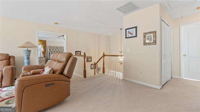 1657 Stilesboro Ridge Dr, Kennesaw, GA 30152 - carpeted living area featuring attic access and baseboards