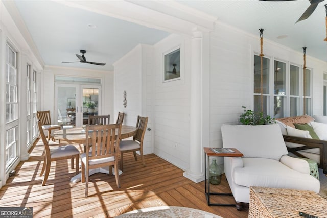 sunroom with ceiling fan and french doors