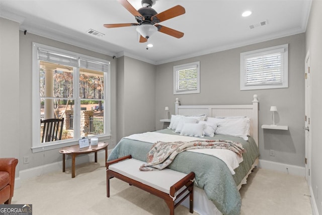 bedroom featuring light colored carpet, visible vents, and crown molding