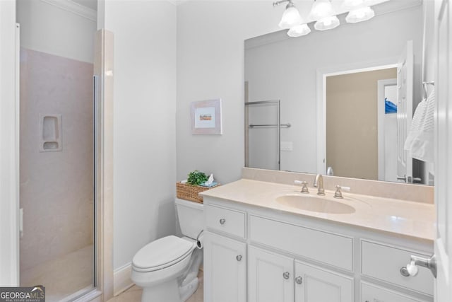 bathroom with ornamental molding, a shower stall, toilet, and vanity