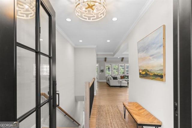 hallway with crown molding, recessed lighting, an upstairs landing, wood finished floors, and baseboards