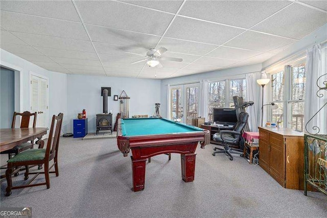 game room featuring a paneled ceiling, ceiling fan, light carpet, and french doors