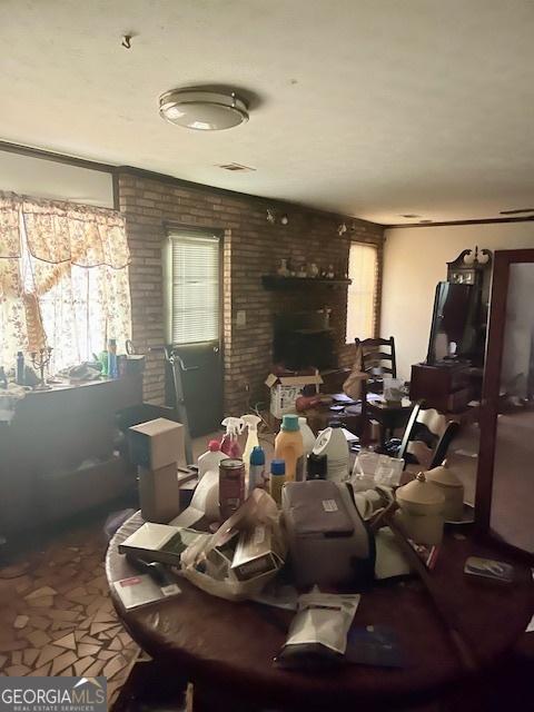 3210 Rogers Rd, Mcdonough, GA 30252 - living area with brick wall