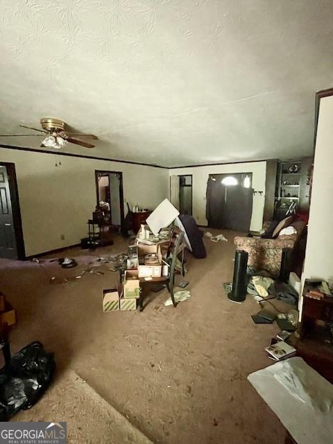 3210 Rogers Rd, Mcdonough, GA 30252 - carpeted living area featuring ceiling fan and a textured ceiling