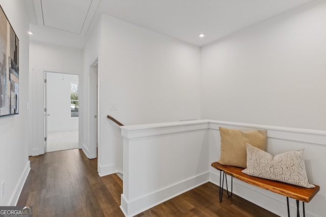 interior space featuring dark wood-style flooring, recessed lighting, and baseboards