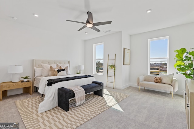 bedroom with ceiling fan, recessed lighting, light carpet, visible vents, and baseboards