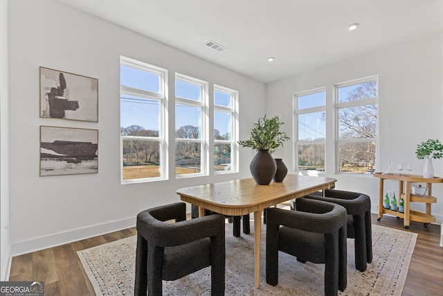 dining room featuring recessed lighting, visible vents, dark wood finished floors, and baseboards