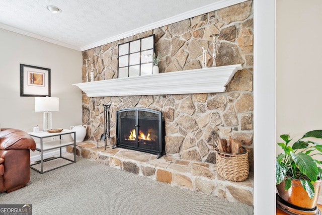 interior details with carpet floors, a textured ceiling, a fireplace, and crown molding