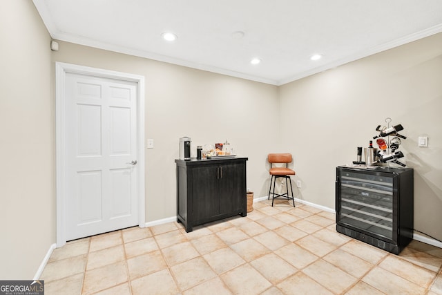 bar featuring ornamental molding, wine cooler, recessed lighting, and baseboards