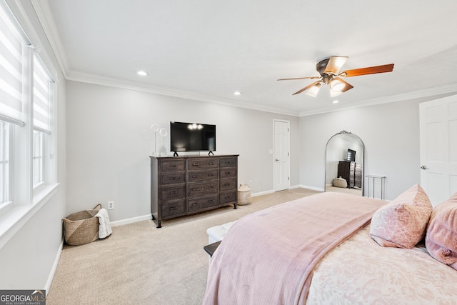 bedroom with recessed lighting, baseboards, crown molding, and light colored carpet