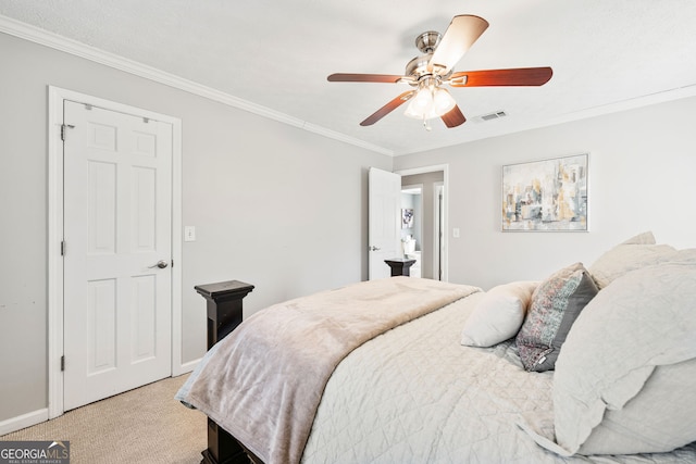 bedroom with light carpet, baseboards, visible vents, ceiling fan, and ornamental molding