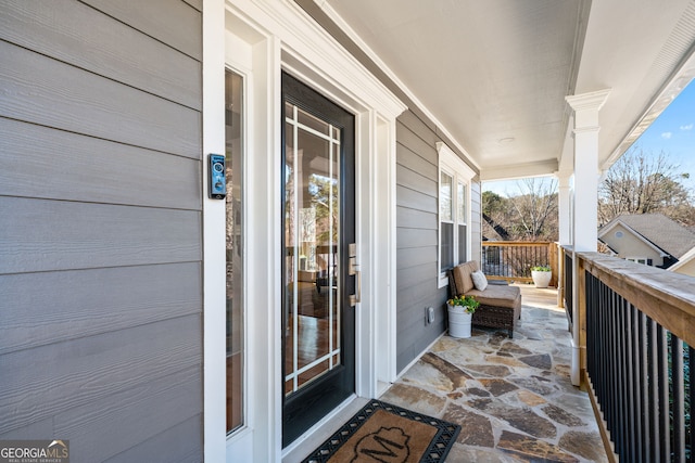 balcony featuring covered porch