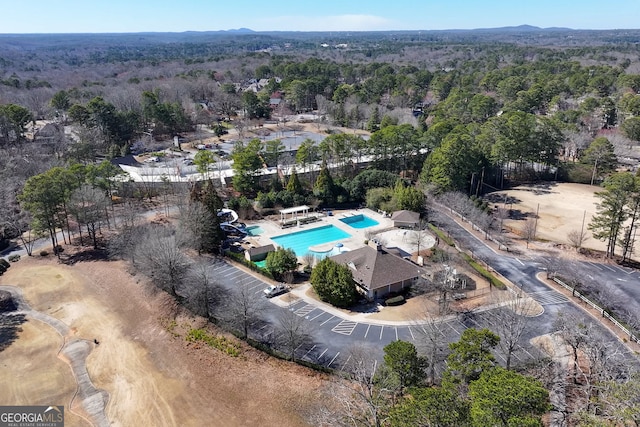 bird's eye view featuring a view of trees