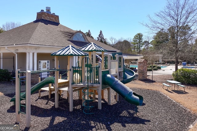 community play area featuring fence