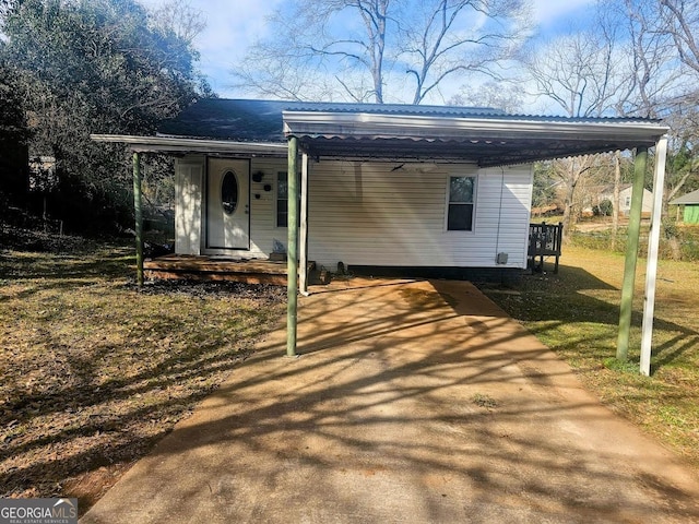 view of front of house with a carport