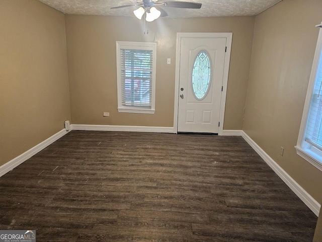 117 Triune Mill Rd, Thomaston, GA 30286 - foyer featuring dark wood finished floors, ceiling fan, baseboards, and a textured ceiling
