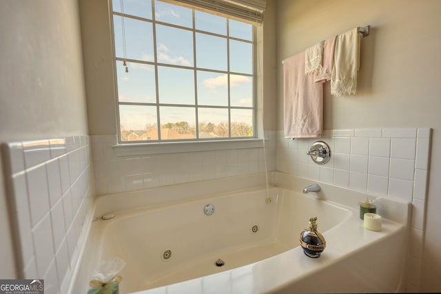 bathroom with a jetted tub