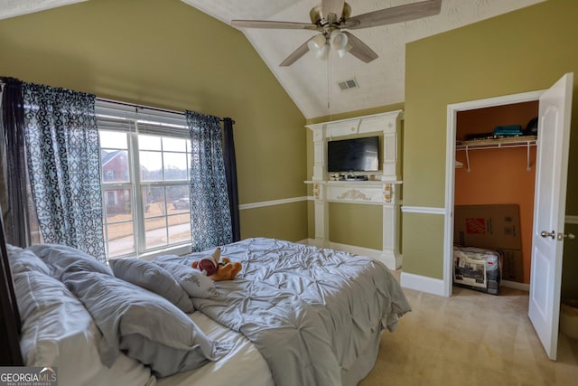 bedroom featuring baseboards, visible vents, light colored carpet, a textured ceiling, and high vaulted ceiling