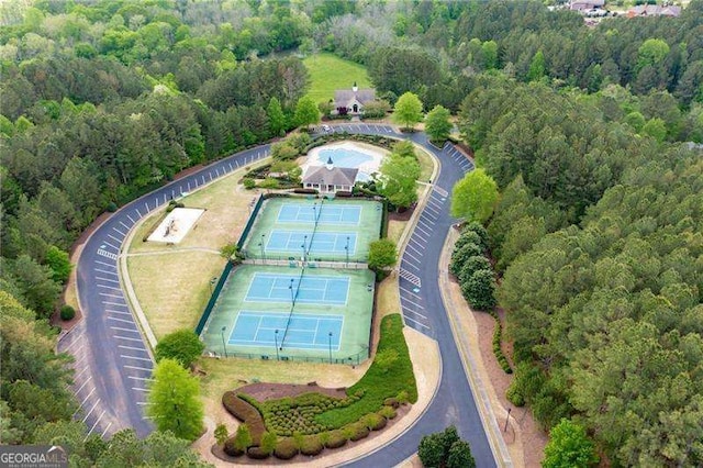 aerial view featuring a view of trees