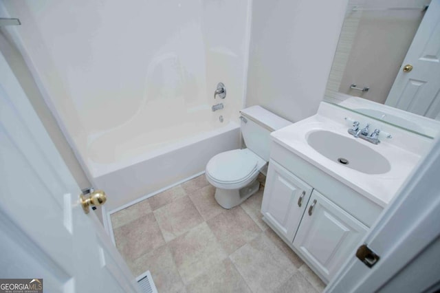 full bath with toilet, visible vents, bathing tub / shower combination, and vanity