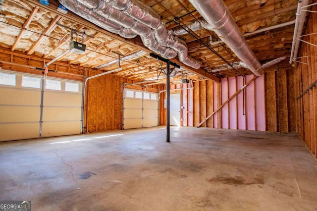 garage featuring a garage door opener