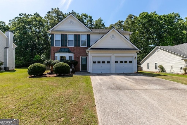 traditional-style house with a garage, concrete driveway, brick siding, and a front yard