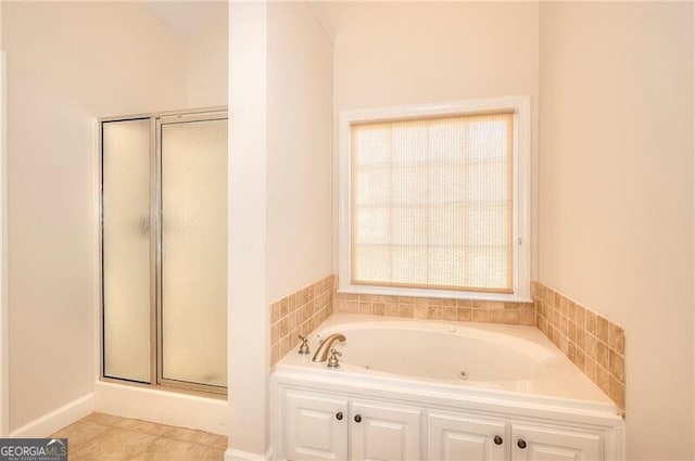 full bath with a shower with shower door, a bath, and tile patterned floors