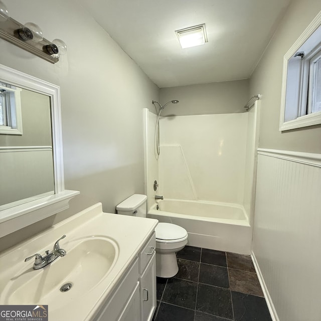 full bathroom with toilet, shower / washtub combination, and vanity