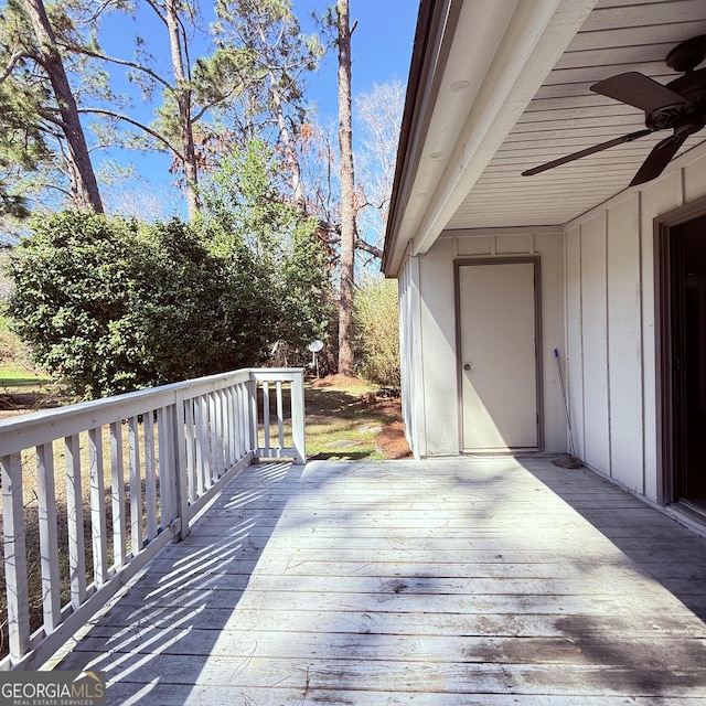 wooden terrace with ceiling fan