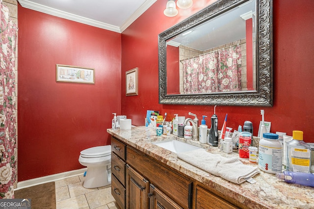 bathroom with crown molding, toilet, vanity, a shower with curtain, and baseboards