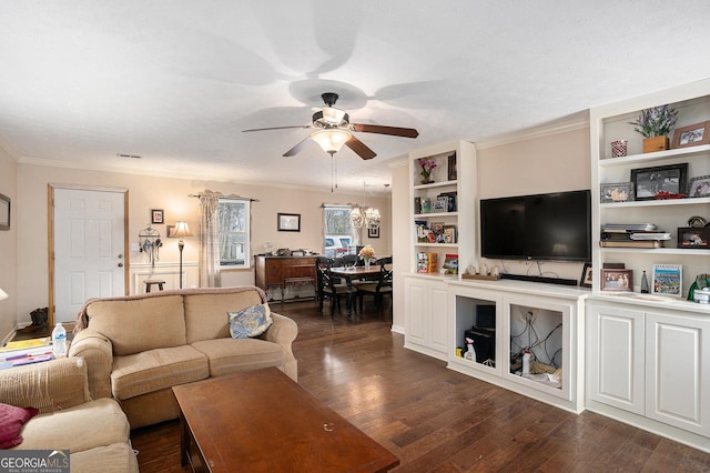 living area with dark wood-style floors, visible vents, ornamental molding, and a ceiling fan