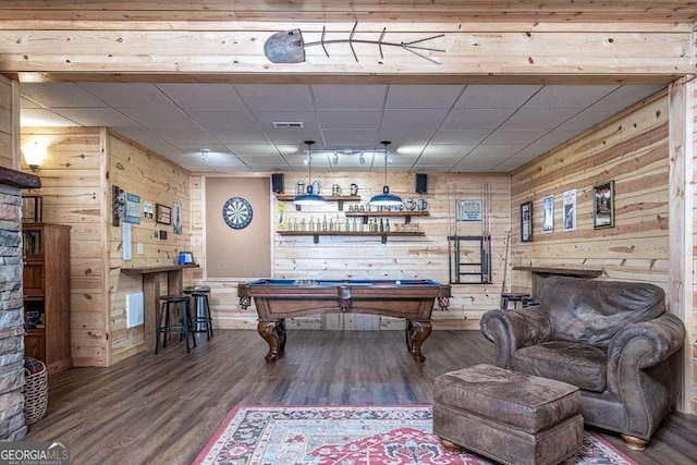 playroom featuring a paneled ceiling, pool table, visible vents, wooden walls, and wood finished floors