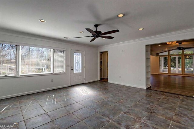 empty room featuring ceiling fan, recessed lighting, visible vents, baseboards, and ornamental molding