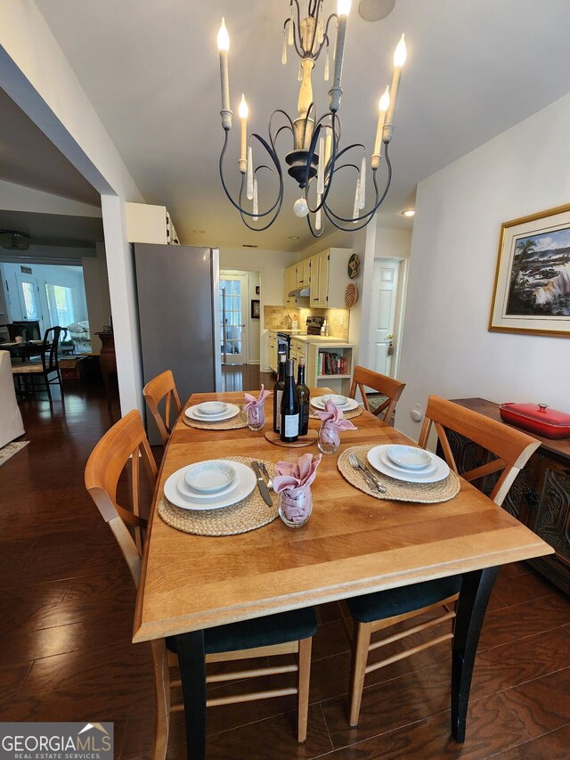 185 Starlight Dr, Sautee Nacoochee, GA 30571 - dining room featuring a notable chandelier and dark wood finished floors
