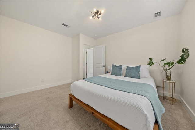 bedroom featuring carpet, visible vents, and baseboards