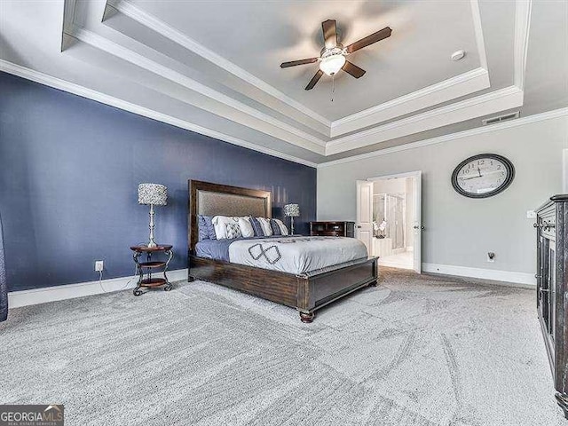 bedroom featuring light carpet, a raised ceiling, visible vents, and baseboards