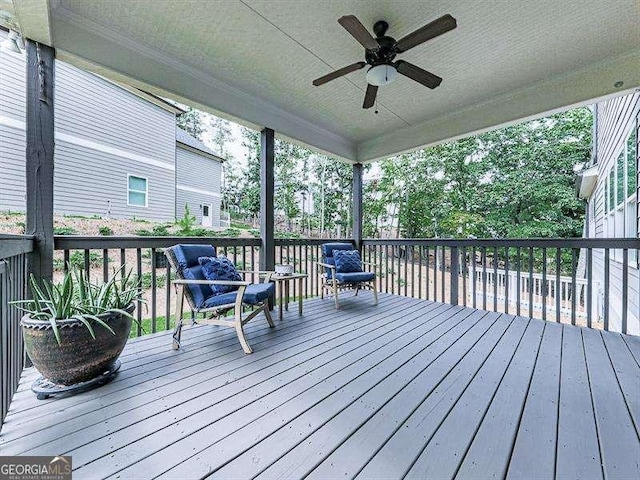 wooden terrace with ceiling fan