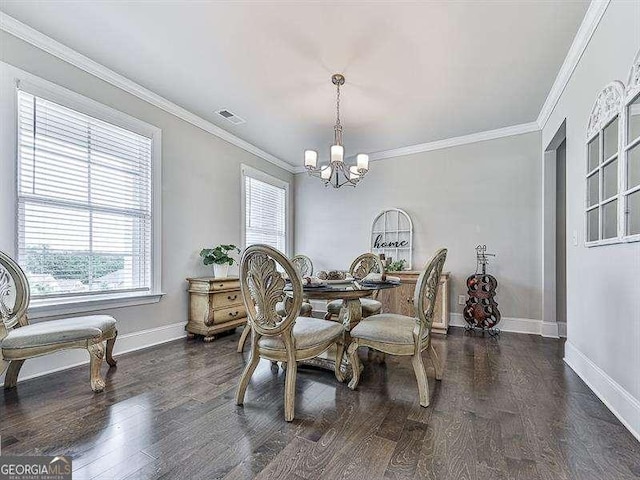 dining area with a notable chandelier, crown molding, visible vents, and dark wood-style flooring