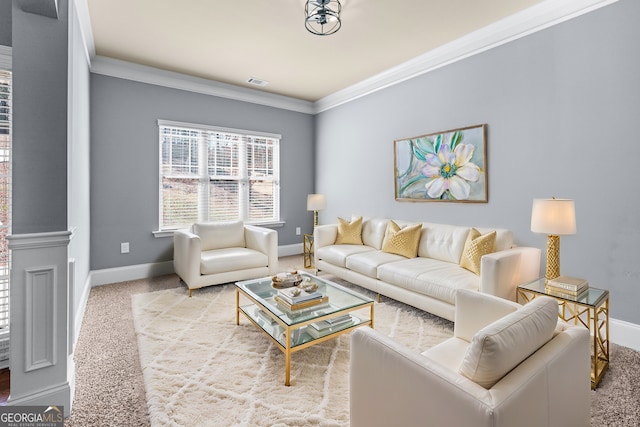 living area featuring ornamental molding, carpet flooring, visible vents, and baseboards