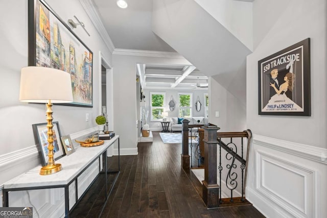 corridor featuring baseboards, coffered ceiling, dark wood-style flooring, an upstairs landing, and beam ceiling