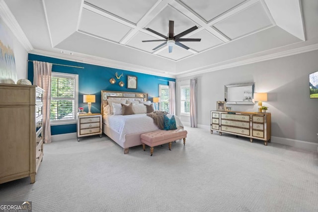 bedroom with carpet floors, baseboards, coffered ceiling, and crown molding